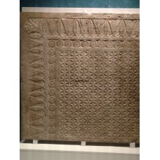 Carved door-sill, geometrically derived solar discs